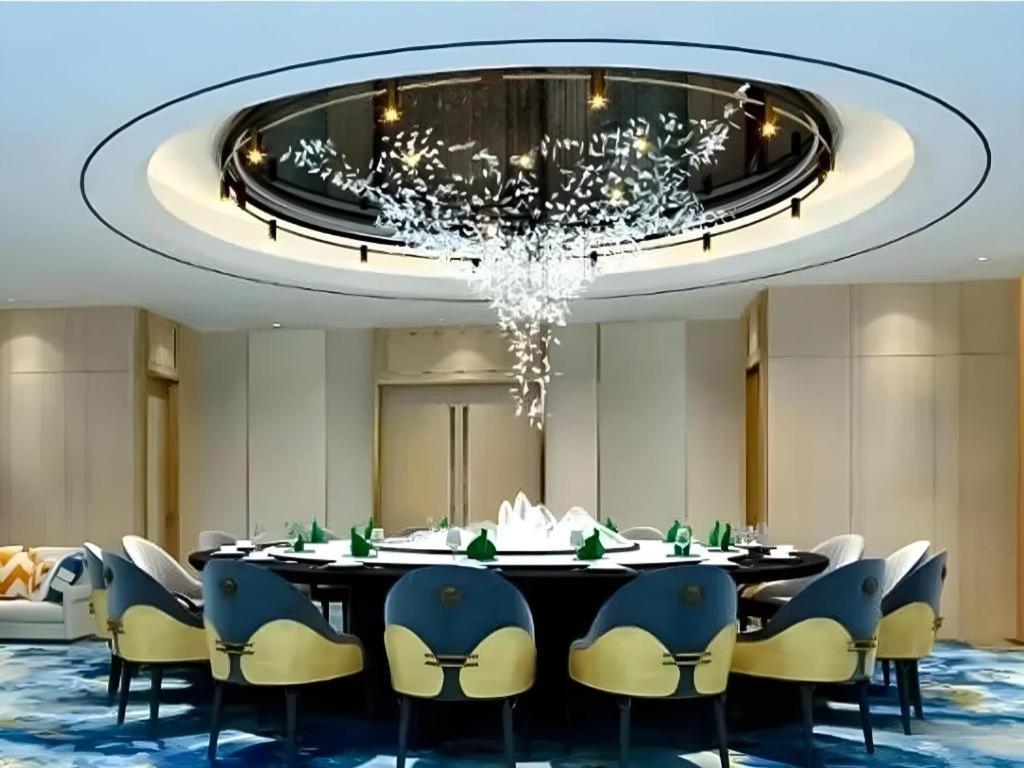 Fenggang Gladden Hotel Tiantangwei Экстерьер фото