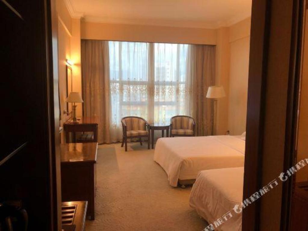 Fenggang Gladden Hotel Tiantangwei Экстерьер фото