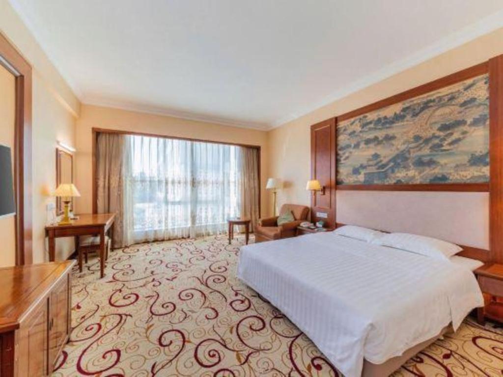 Fenggang Gladden Hotel Tiantangwei Экстерьер фото