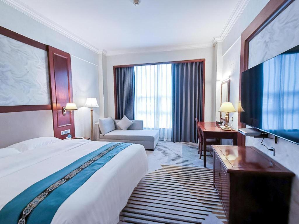 Fenggang Gladden Hotel Tiantangwei Экстерьер фото