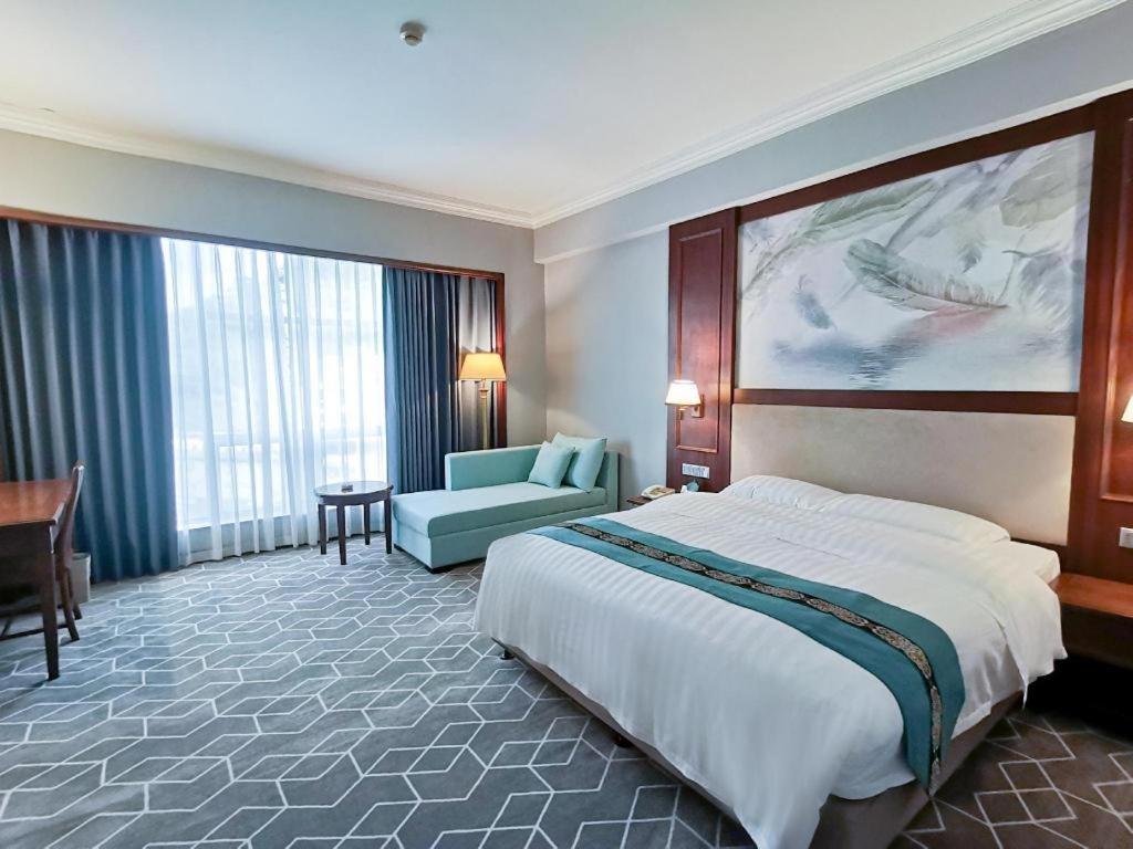 Fenggang Gladden Hotel Tiantangwei Экстерьер фото