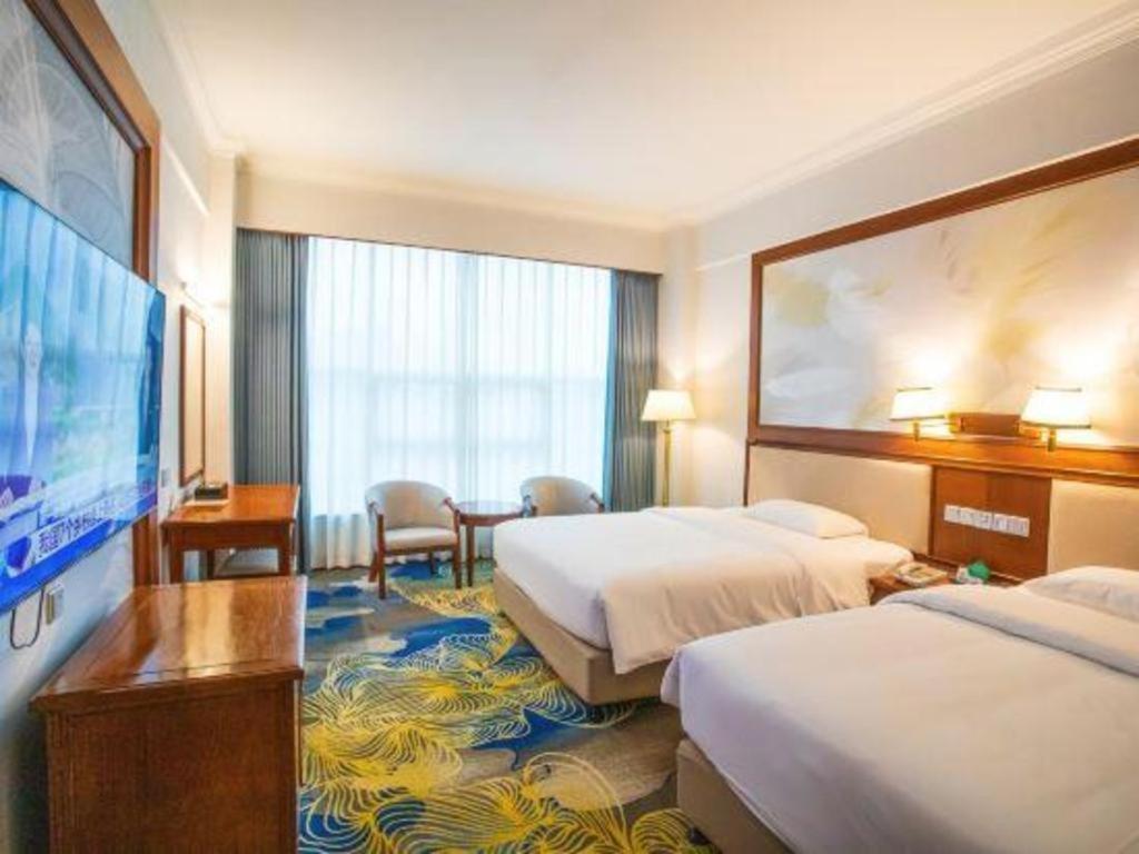 Fenggang Gladden Hotel Tiantangwei Экстерьер фото