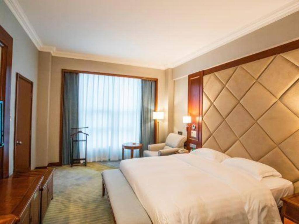 Fenggang Gladden Hotel Tiantangwei Экстерьер фото