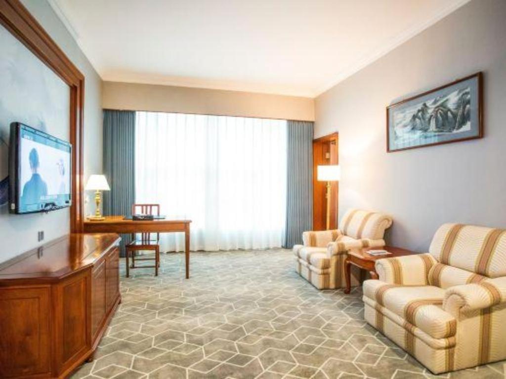 Fenggang Gladden Hotel Tiantangwei Экстерьер фото