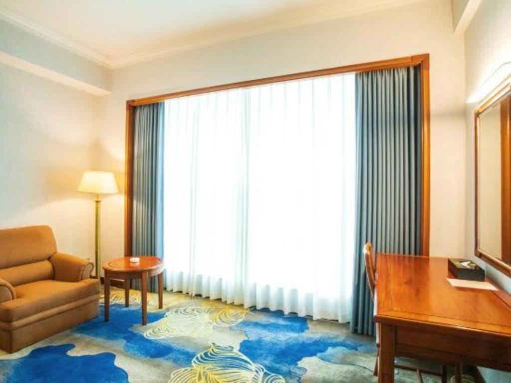 Fenggang Gladden Hotel Tiantangwei Экстерьер фото