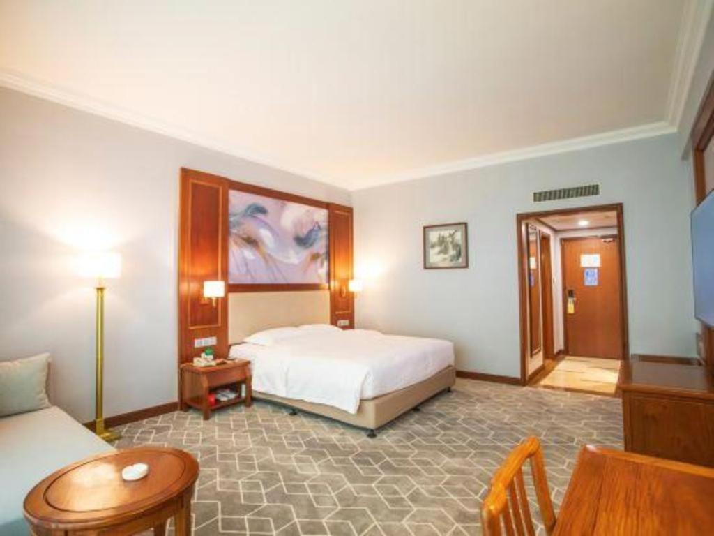 Fenggang Gladden Hotel Tiantangwei Экстерьер фото