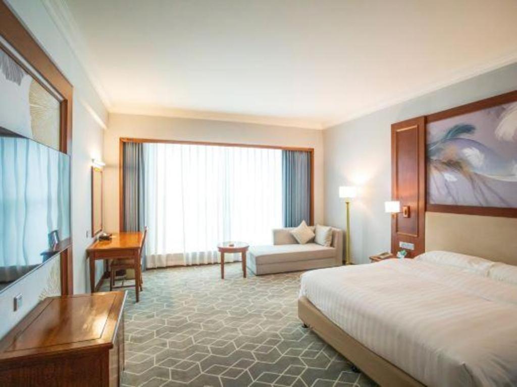 Fenggang Gladden Hotel Tiantangwei Экстерьер фото