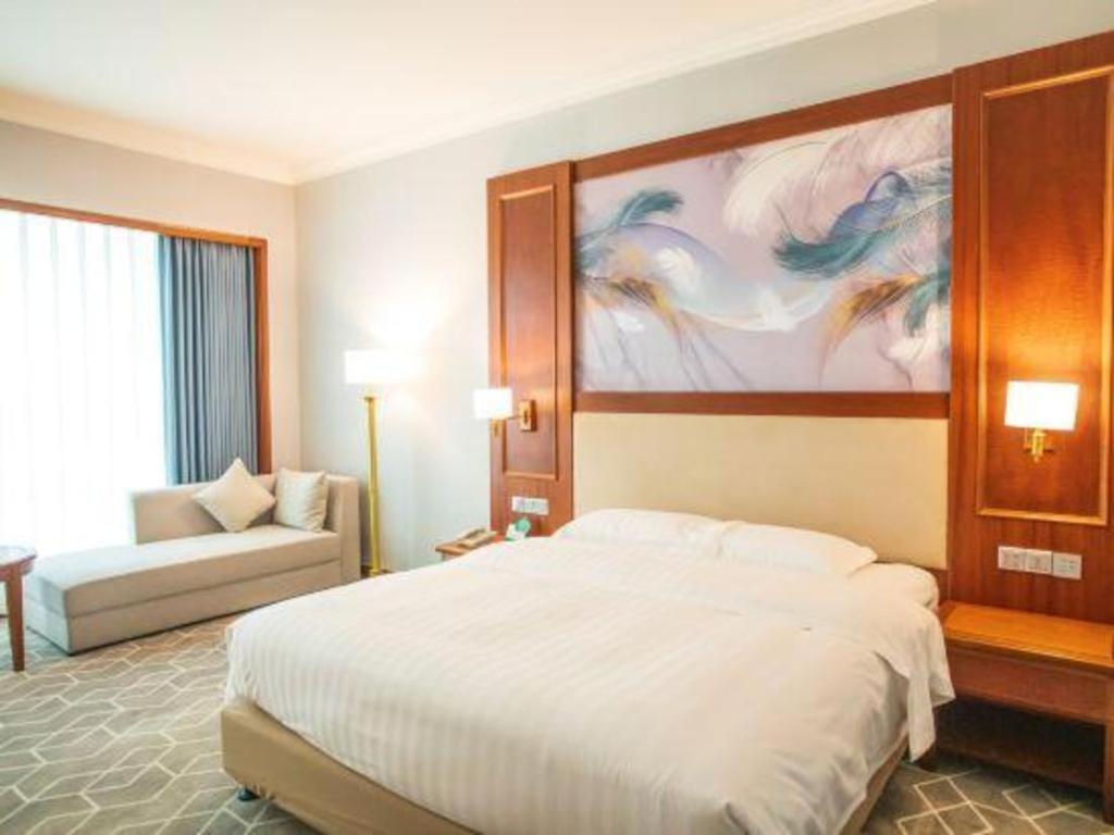 Fenggang Gladden Hotel Tiantangwei Экстерьер фото