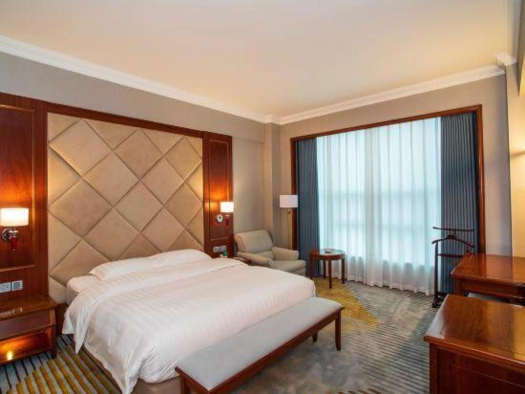 Fenggang Gladden Hotel Tiantangwei Экстерьер фото