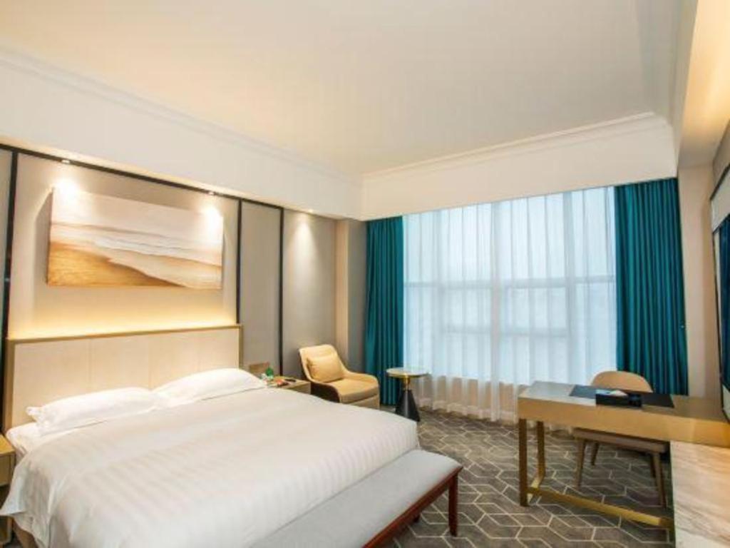 Fenggang Gladden Hotel Tiantangwei Экстерьер фото