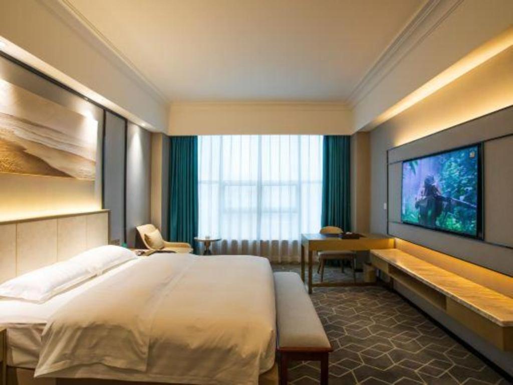 Fenggang Gladden Hotel Tiantangwei Экстерьер фото