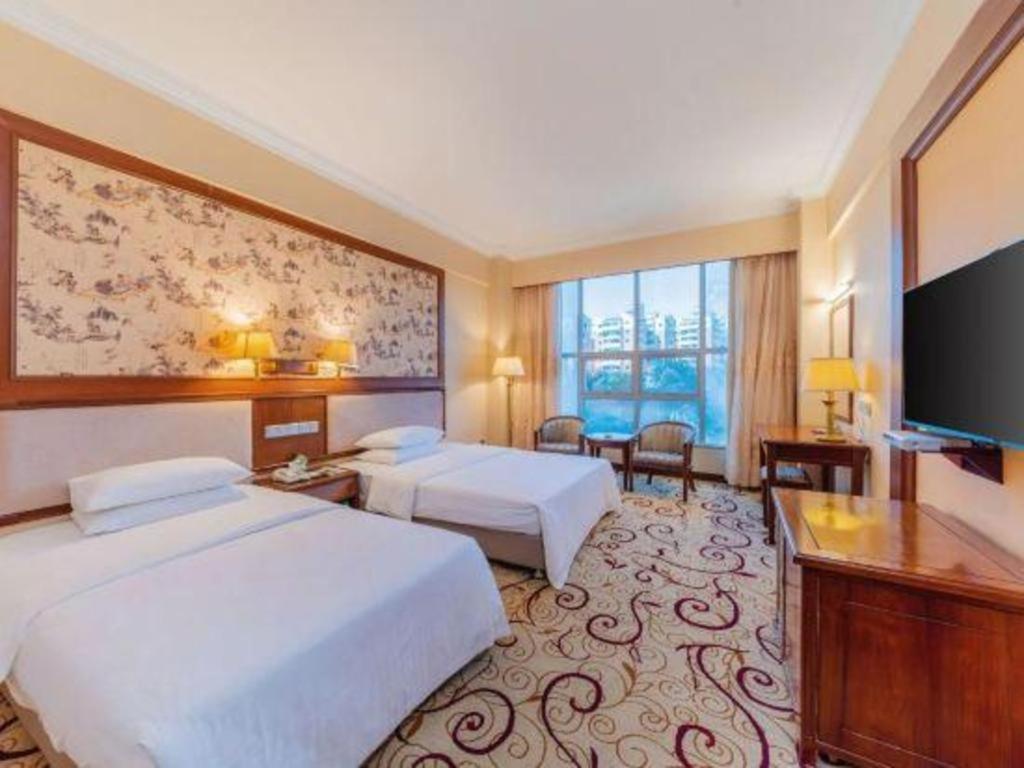 Fenggang Gladden Hotel Tiantangwei Экстерьер фото