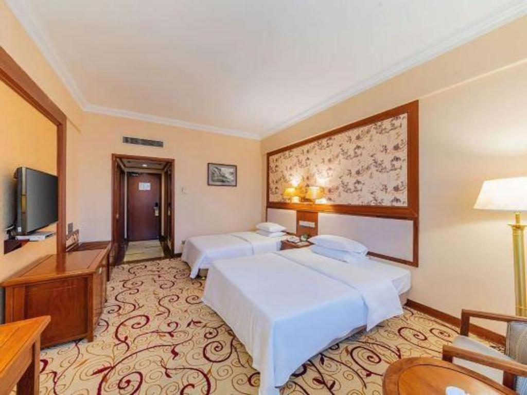 Fenggang Gladden Hotel Tiantangwei Экстерьер фото