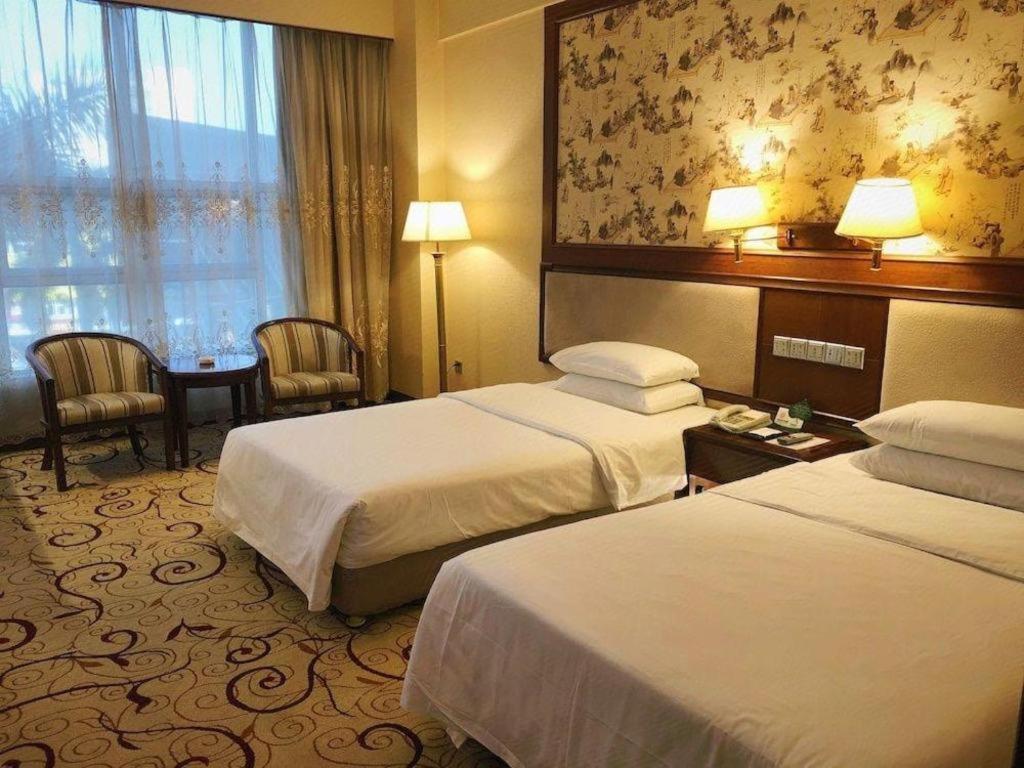 Fenggang Gladden Hotel Tiantangwei Экстерьер фото