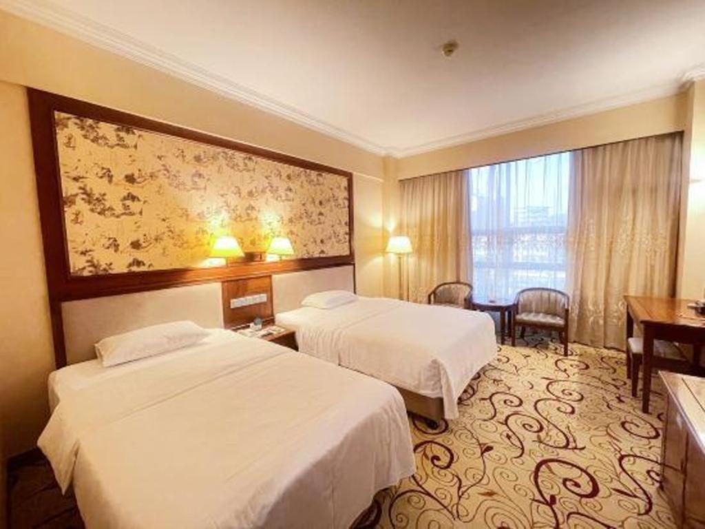 Fenggang Gladden Hotel Tiantangwei Экстерьер фото