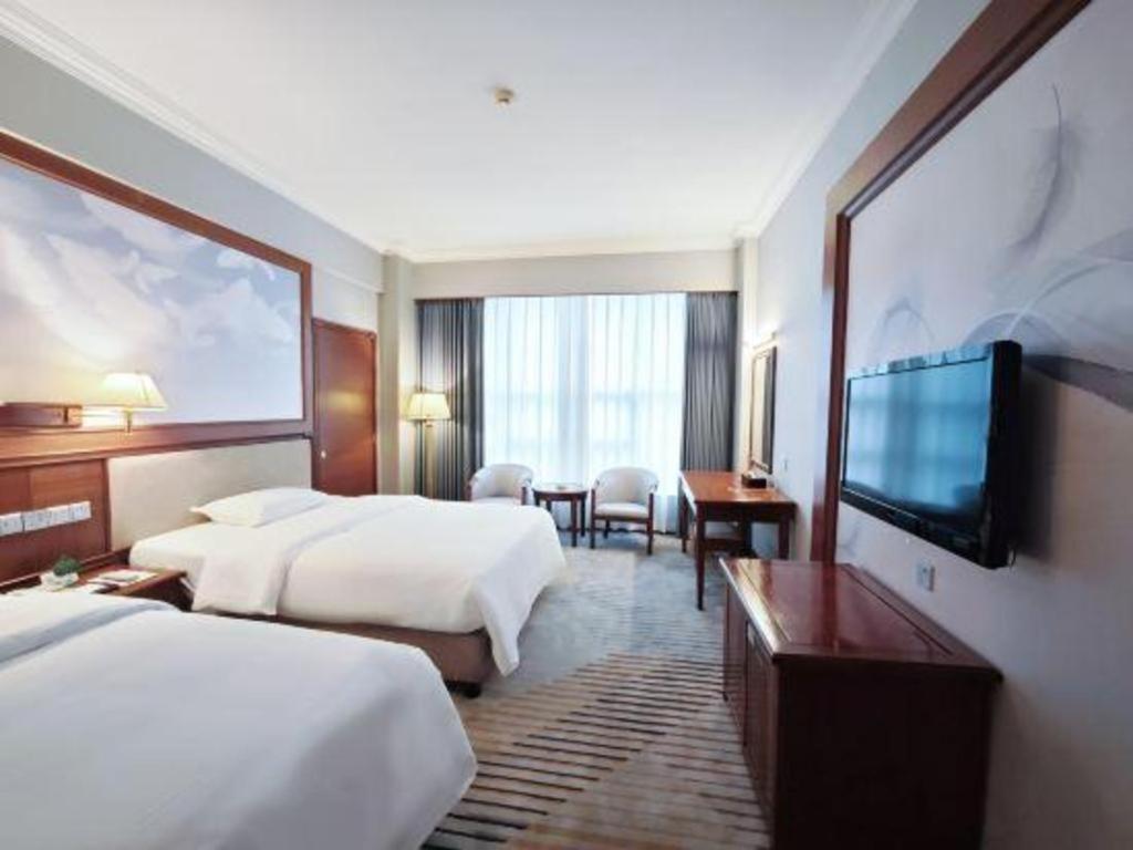 Fenggang Gladden Hotel Tiantangwei Экстерьер фото