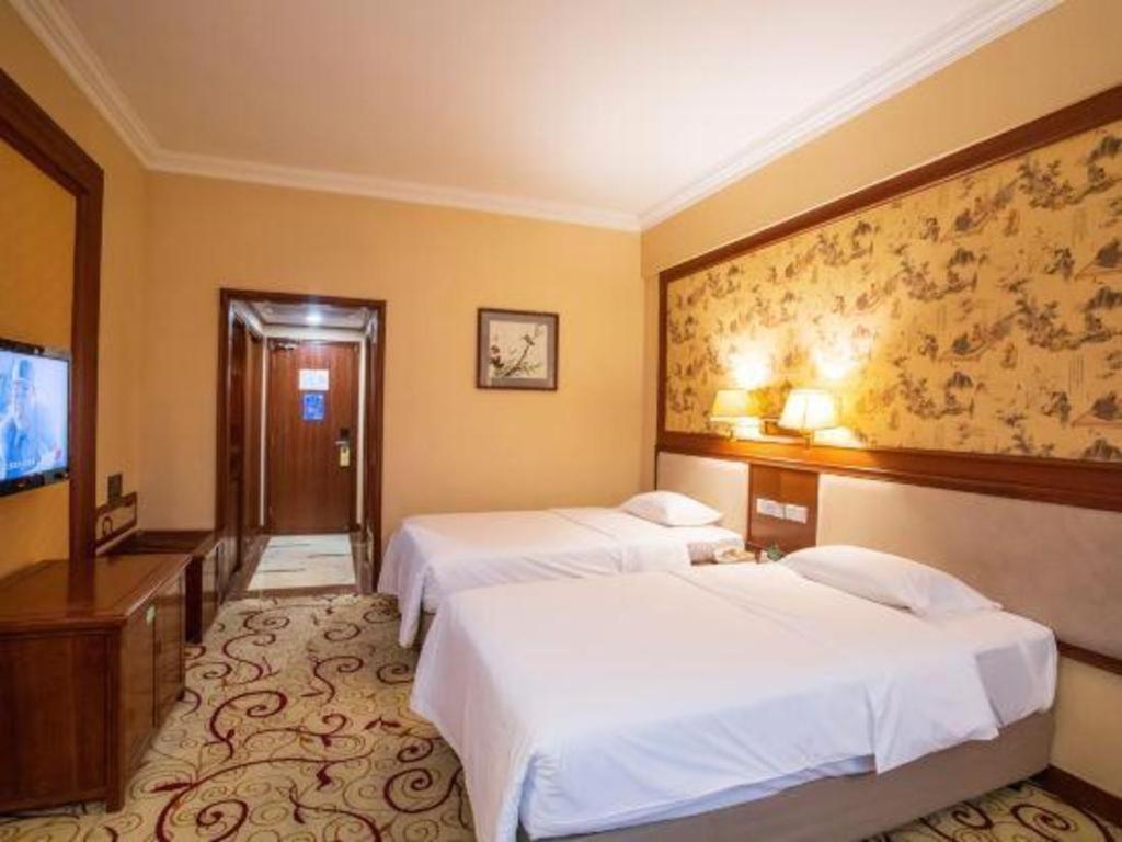 Fenggang Gladden Hotel Tiantangwei Экстерьер фото