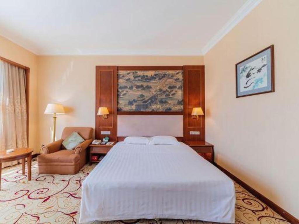 Fenggang Gladden Hotel Tiantangwei Экстерьер фото