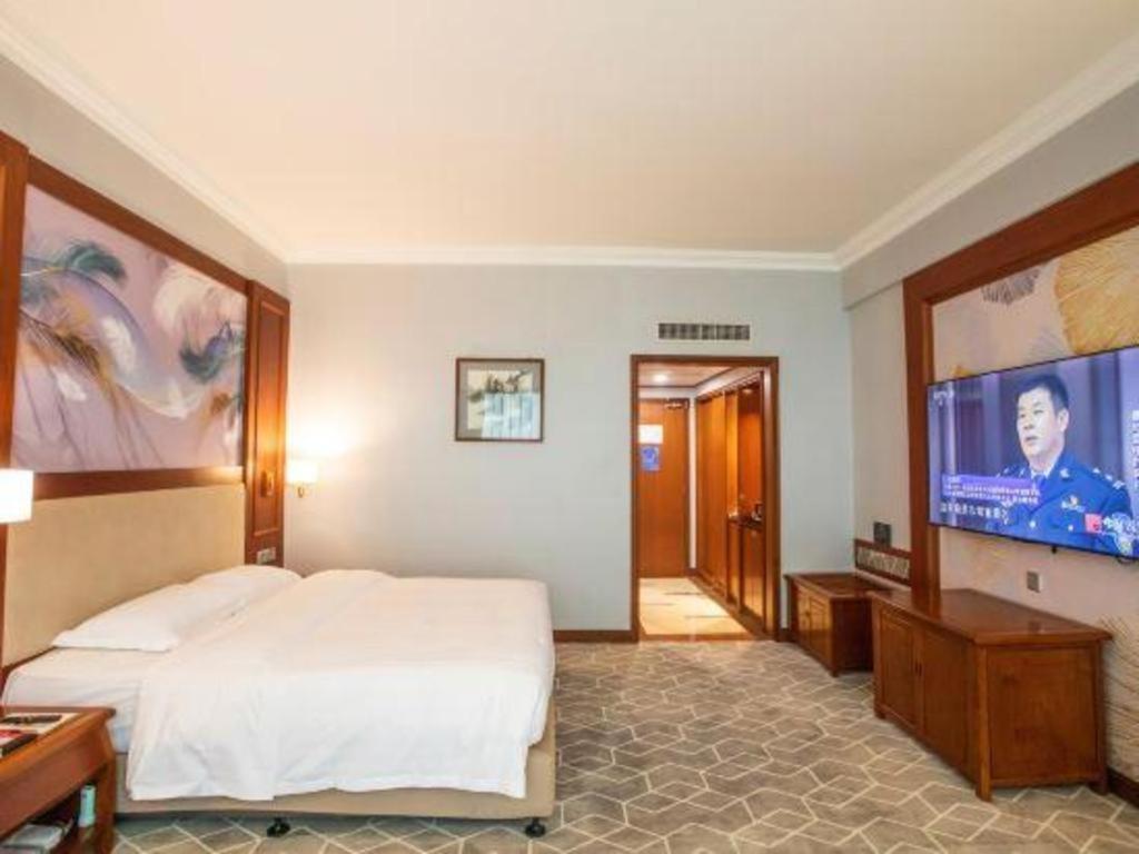 Fenggang Gladden Hotel Tiantangwei Экстерьер фото