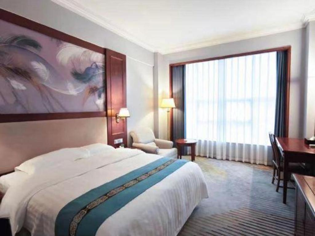Fenggang Gladden Hotel Tiantangwei Экстерьер фото