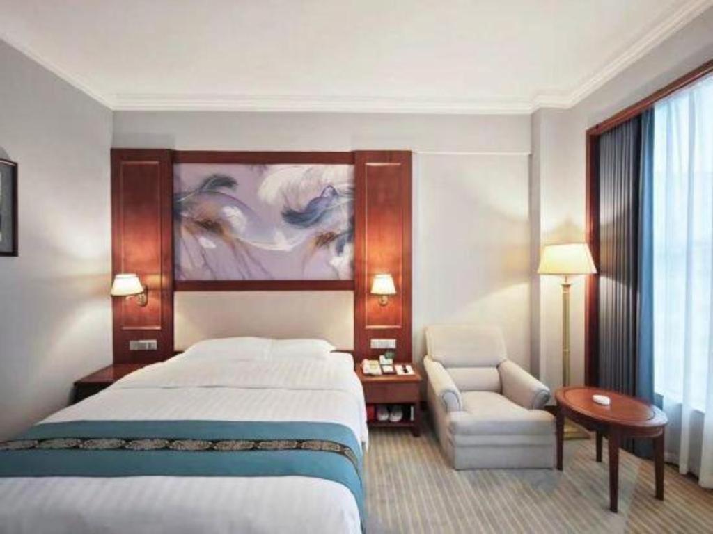 Fenggang Gladden Hotel Tiantangwei Экстерьер фото