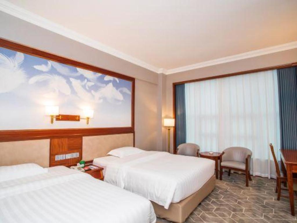 Fenggang Gladden Hotel Tiantangwei Экстерьер фото